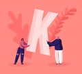 Young Fashioned Woman and Hipster Man in Casual Clothing Holding Huge Letter K in Hand. Concept of Gratitude Royalty Free Stock Photo