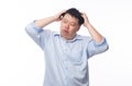 Young Fat Asian business man feeling sad with unhappy face isolated on white background. Royalty Free Stock Photo