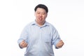 Young Fat Asian business man raising his fists with funny face Royalty Free Stock Photo