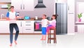 young father cooking with childrent at kitchen fatherhood parenting concept horizontal