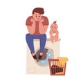 Young father doing laundry and sitting on washing machine with baby. Dad doing household chores. Housekeeping and