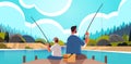 Young father fishing with son parenting fatherhood concept dad teaching his kid catching fish at lake Royalty Free Stock Photo