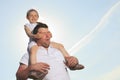 Young father with his daughter outdoor on a summer Royalty Free Stock Photo