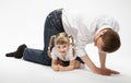 Young father and his happy little daugther playing Royalty Free Stock Photo