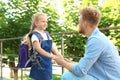 Young father and his little child on their way to school Royalty Free Stock Photo