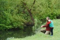 Young father and his son fishing together Royalty Free Stock Photo