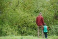 Young father and his son fishing together Royalty Free Stock Photo