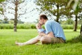 Young father kissing his funny newborn son outdoor Royalty Free Stock Photo