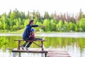 Young father and little girl fishing outdoor Royalty Free Stock Photo