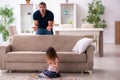 Young father and little girl indoors Royalty Free Stock Photo