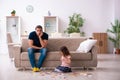 Young father and little girl indoors Royalty Free Stock Photo