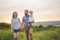 Young father and mother with their cute daughter Royalty Free Stock Photo