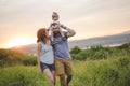 Young father and mother with their cute daughter Royalty Free Stock Photo