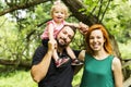 Young father and mother with their cute little daughter Royalty Free Stock Photo