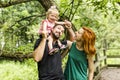 Young father and mother with their cute little daughter Royalty Free Stock Photo