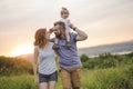 Young father and mother with their cute daughter Royalty Free Stock Photo