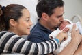 Young father and mother with their newborn baby girl at the hospital on the day of her birth. Family concept. Parenthood concept Royalty Free Stock Photo