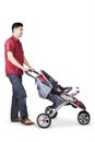 Young father pushing a baby carriage