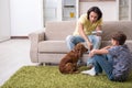 Young father and his son with cocker spaniel dog Royalty Free Stock Photo