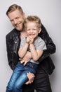 Young father and son playing together. Fathers day Royalty Free Stock Photo