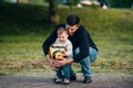 Young father spend time win small son, playing and have fun Royalty Free Stock Photo