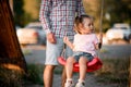 Young father swing his little daughter on swing Royalty Free Stock Photo