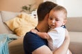 Father comforting crying baby Royalty Free Stock Photo