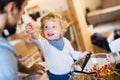 Young father with a toddler boy cooking. Royalty Free Stock Photo