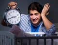 Young father under stress due to baby crying at night Royalty Free Stock Photo