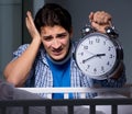 Young father under stress due to baby crying at night Royalty Free Stock Photo