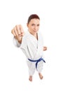 Young female aikido fighter attacking
