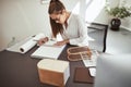 Young female architect working on a project in her office Royalty Free Stock Photo