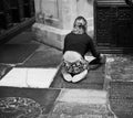 Young female artist in Bristol Cathedral in black and white