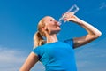 Young female athlete drinkig water Royalty Free Stock Photo