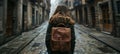 Young female backpacker exploring old town streets in spain on solo travel adventure