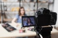 Young female beauty blogger on camera screen Royalty Free Stock Photo