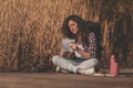 Female biologist writing in notebook during field work