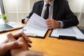 A Young Female Business women Applicant In Office Male Manager Interviewing holding resume and speaking to employer, job Interview Royalty Free Stock Photo