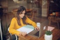 Young female businesswoman making business plan Royalty Free Stock Photo