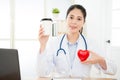 Young female cardiology doctor face to camera