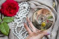 Young female caucasian hand holding a martini with olives, closeup, top view Royalty Free Stock Photo