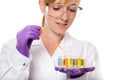 Young female chemist doing some research, isolated Royalty Free Stock Photo