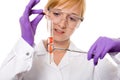 Young female chemist doing some research, isolated Royalty Free Stock Photo