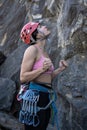 Female climber standing preparing for ascent