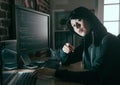 Young female computer programmer as hacker Royalty Free Stock Photo