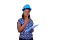 Young female construction engineer thinking about what to write on clipboard Royalty Free Stock Photo