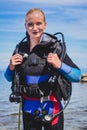 Young female diver outside