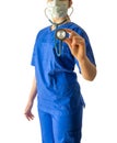 Young female doctor in blue medical uniform holding stethoscope Royalty Free Stock Photo