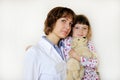 Young female doctor with a cute little patient Royalty Free Stock Photo