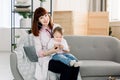 Young female Doctor examining a little baby girl by stethoscope. Baby in doctor`s office for medical checkup Royalty Free Stock Photo